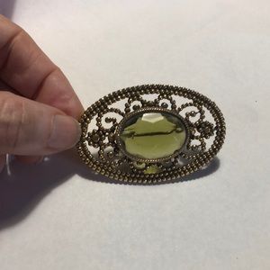 Vintage gold and green brooch.